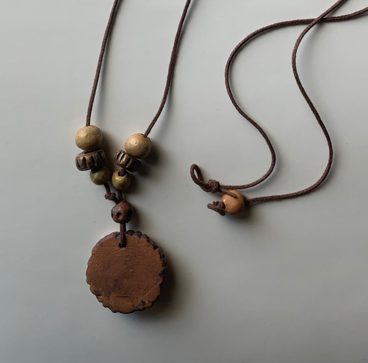 Terracotta necklace with Armenian motifes