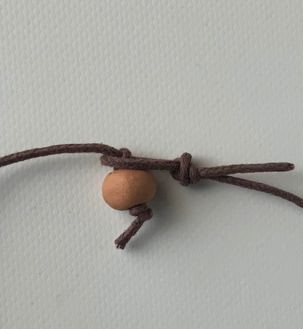 Terracotta necklace with Armenian motifes