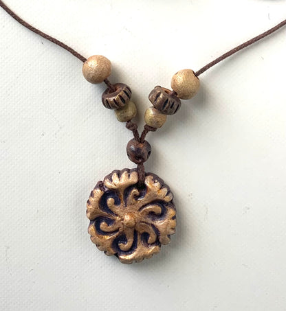 Terracotta necklace with Armenian motifes