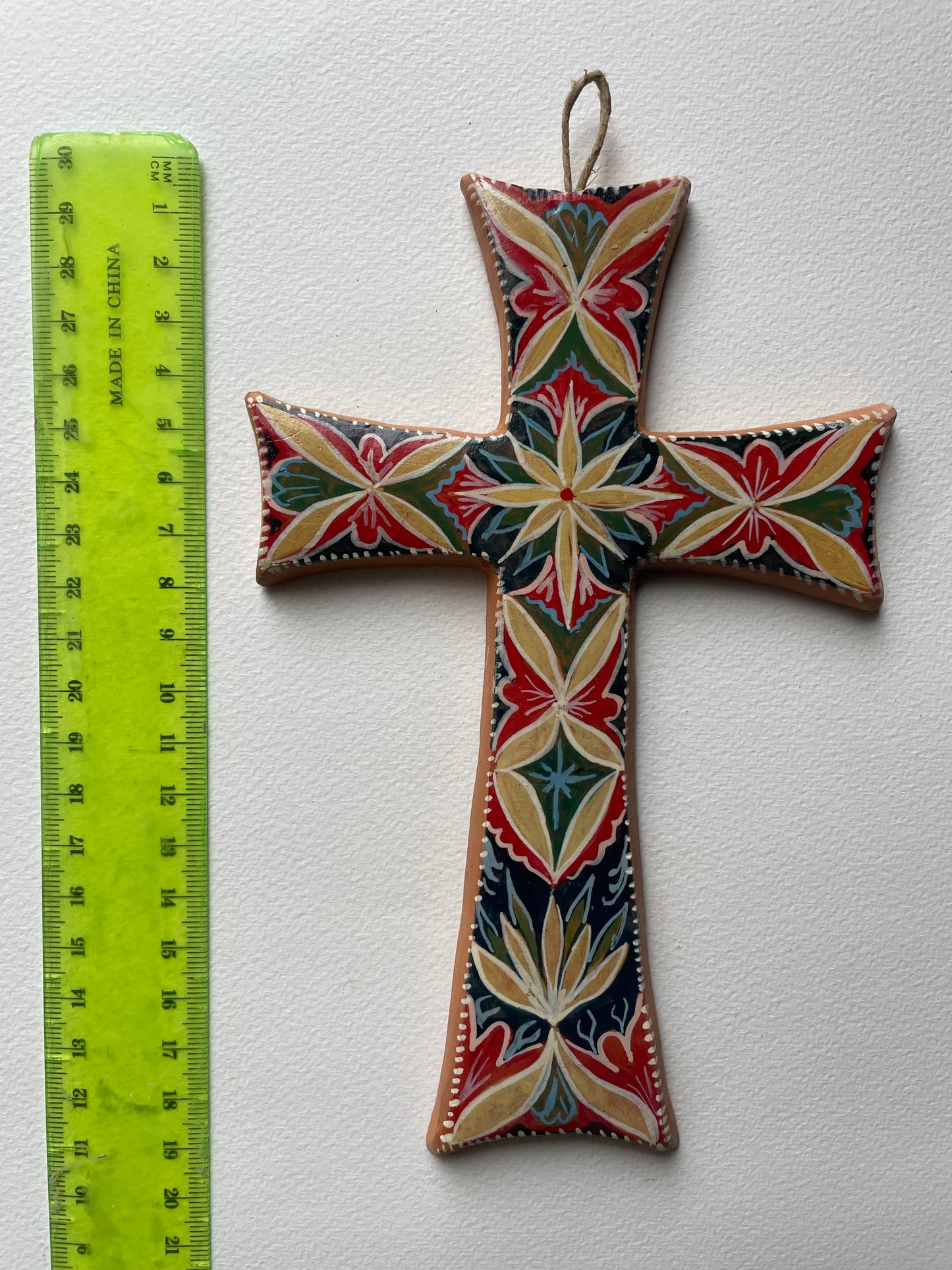 Decorated cross with ornamental motifs